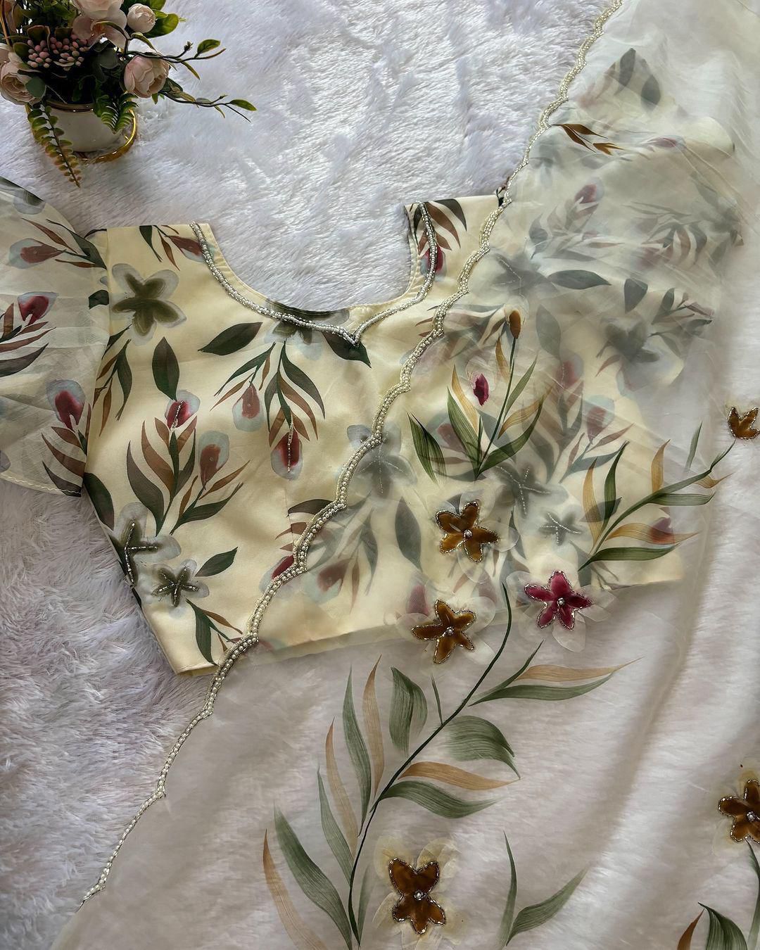 Elegant Floral Handprint Organza Saree with Pearl & Cutdana Handwork