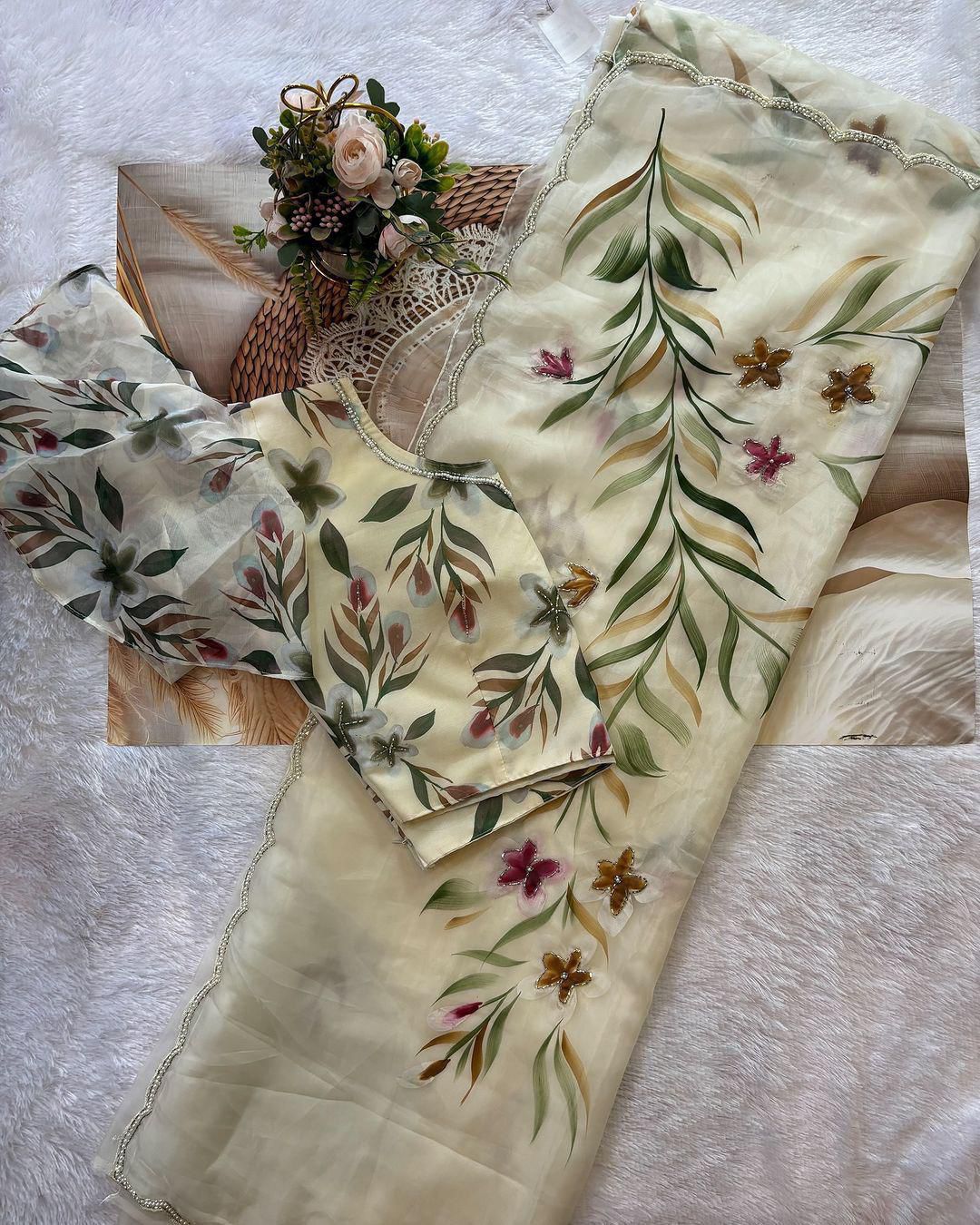 Elegant Floral Handprint Organza Saree with Pearl & Cutdana Handwork