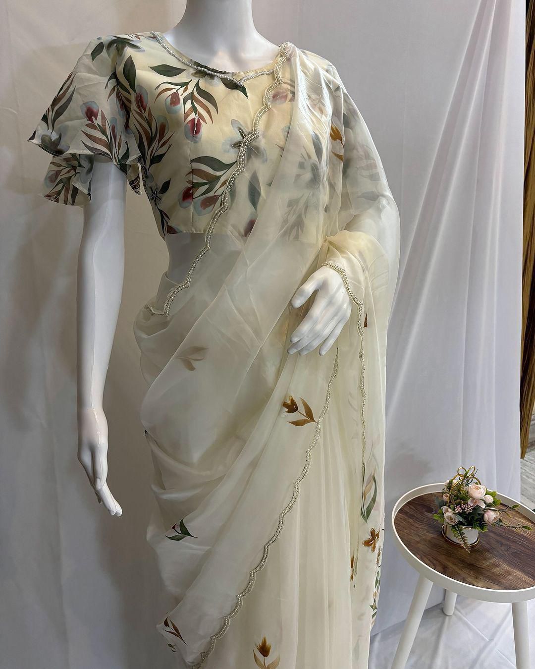 Elegant Floral Handprint Organza Saree with Pearl & Cutdana Handwork