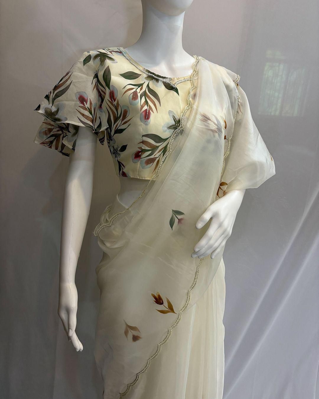 Elegant Floral Handprint Organza Saree with Pearl & Cutdana Handwork